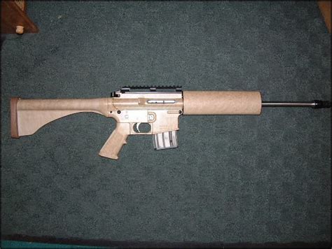 Bushmaster Firearms Inc Lady Bushmaster Carbon 15 Rifle Desert Camo
