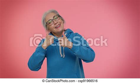 Mature Old Granny Grandmother Showing Thumbs Up And Nodding In Approval