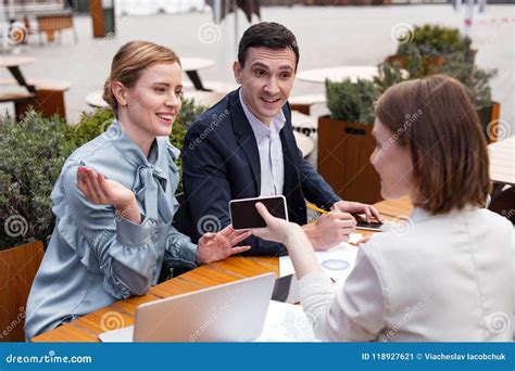Successful Married Business Couple Attending Staff Meeting Stock Image