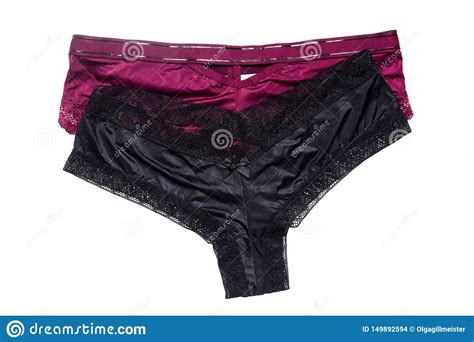 underwear woman isolated close up of luxurious elegant black and a pink satin lacy thongs