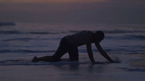 Tired Man Crawling On Beach Steadycam Shot Stock Footage Sbv 319896024