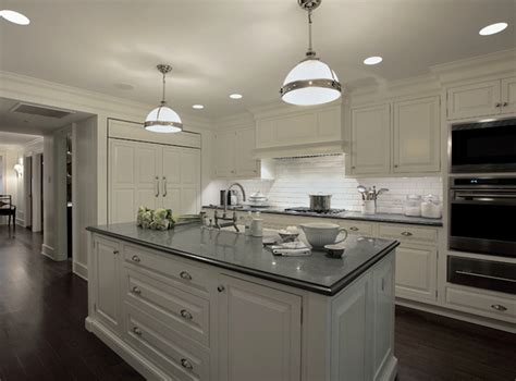 If you want a quartz countertop that will add some contrast to your kitchen, this material is a great option. White Kitchen cabinets with Gray Countertops ...