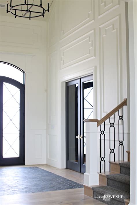 Most of these spaces had neutral/white walls, so the colorfully painted doors really stood out and looked amazing. White Interior with Dark Doors - Remington Avenue
