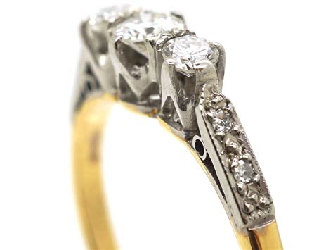 18ct Gold And Platinum Three Stone Diamond Ring With Diamond Set