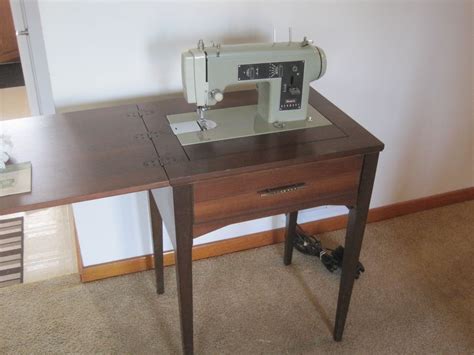 See the correct screws to loosen in order to remove a vintage sewing machine from a cabinet. Sears Kenmore Vintage 60's Zig-Zag Sewing Machine model ...