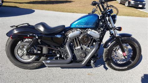 Recalling the iconic rebel styling. 2015 Harley Davidson Forty Eight Hard Candy Cancun Blue ...