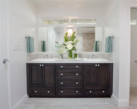 No master suite can be the talk of the town unless it contains the right equipment, i.e., bathroom vanities and sink. Walnut Double Vanity with Crystal Knobs in Elegant Master ...