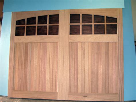 Replacing a garage door is an easy way to boost your home's curb appeal, and research shows this home improvement project has a high return where will your garage door replacement cost fall on this spectrum? Clingerman Doors - Custom Wood Garage Doors - Clearville, PA