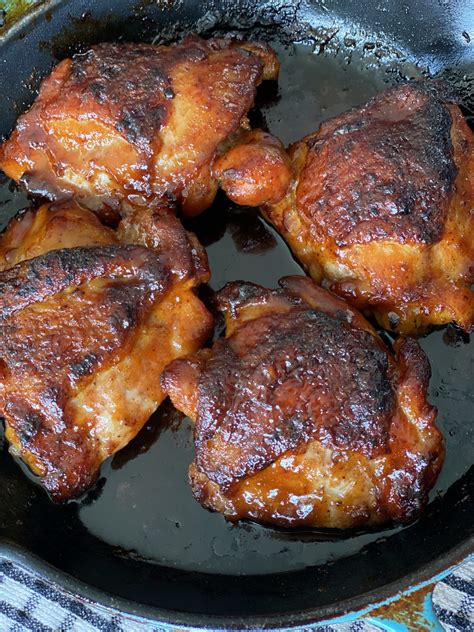 Baked chicken thighs are crispy on the outside and very tender on the inside. Oven Roasted Honey BBQ Chicken Thighs - Asili Glam