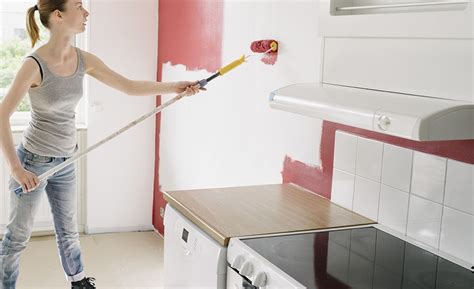 Woman Painting An Accent Wall In A Kitchen In 2021 Easy Kitchen