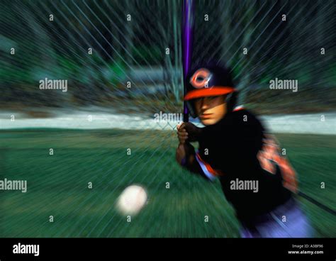 Action Baseball Player Hitting The Ball Stock Photo Alamy