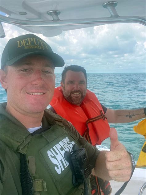 Pilot survives crash in waters off Florida Keys, poses for selfie with