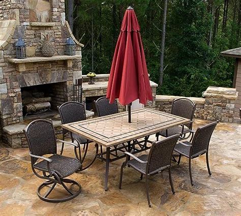 Set Includes One 70 X 42 Stone Outdoor Dining Table With 4 Wicker