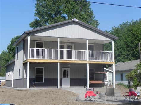 This rv garage plan gives you plenty of room for your vehicles. Barn Living Pole Quarter With Metal Buildings | 30' x 48 ...