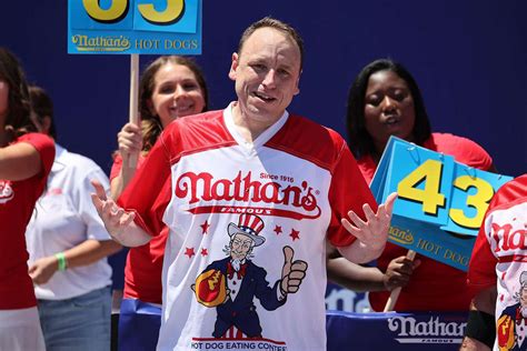 Joey Chestnut Tackles Protester At Nathans Hot Dog Eating Contest