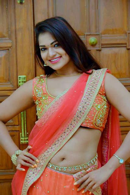 Ashwini Hot Stills In Red Half Saree Exposing Deep Navel With Gold Waist Chain Media Updaters