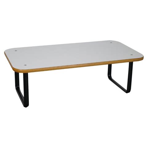 This durable laminate coffee table rests solidly on any surface, and you can adorn it with reading material or decorative items, such as a centerpiece, or an office caddy to create a practical workspace. Knoll White Laminate Coffee Table | Chairish