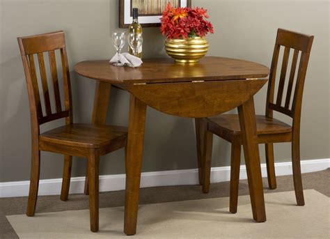 The korey drop leaf dining table is a masterclass in versatility. Simplicity Caramel Extendable Round Drop-Leaf Dining Room ...