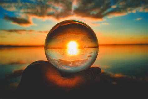 Creative Crystal Lens Ball Photography Of The Sunset With Clouds