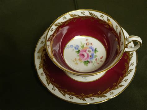 English hand painted floral pattern vintage tea cup and saucer £5.50. Burgundy & Gold with flowers in center Paragon Tea Cup and ...