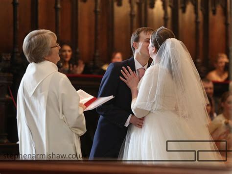 I'm a photographer based in the glorious shropshire countryside. Beverley minster wedding photography colour image of bride and groom at alter kissing by stephen ...
