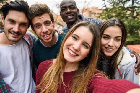 Premium Photo Multiracial Group Of Friends Taking Selfie