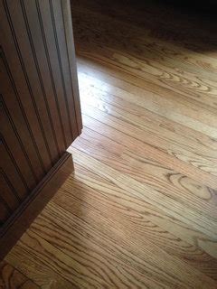 Looking for suggestions for wood floor stain for red oak. Pics of red oak floor stain - early american vs. nutmeg