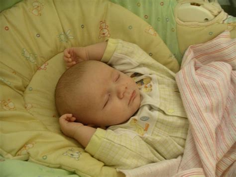 Why Do Babies Sleep With Their Arms Up The Answer May Surprise You