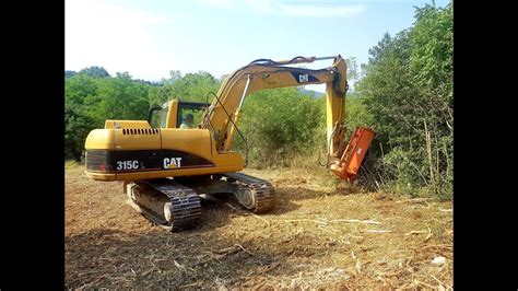 The m315 has a cat 3054 direct injection turbocharged engine producing 116 flywheel horsepower (fwhp). Excavator CAT 315 C with Mulching head / Mulčenje z bagrom ...