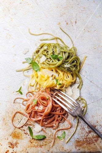 In large skillet, heat oil over medium heat and add garlic, cook, stirring for about 2 minutes. Italian pasta Italian flag colors with basil and parmesan