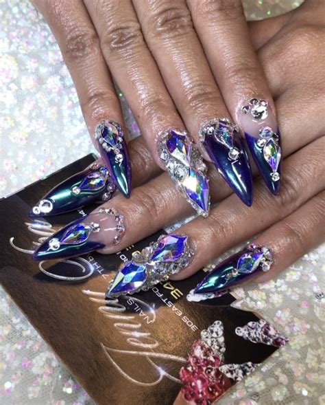 From swarovski crystals to chrome finishes. Cardi B.'s Most Outrageous Nail Art - Essence