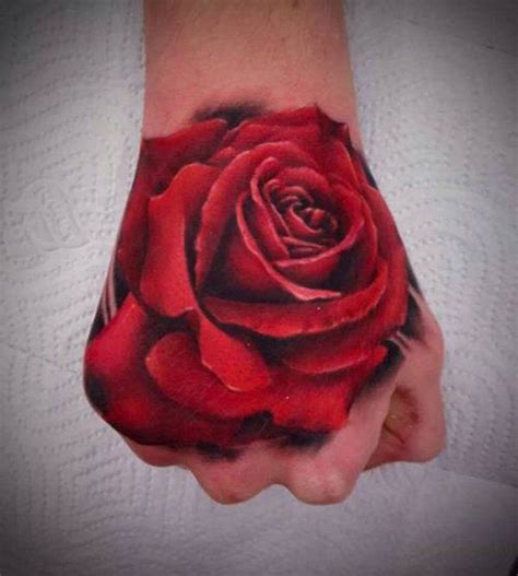 Cool rose tattoo on right hand. 60 Eye-Catching Tattoos on Hand | Cuded | Rose hand tattoo ...