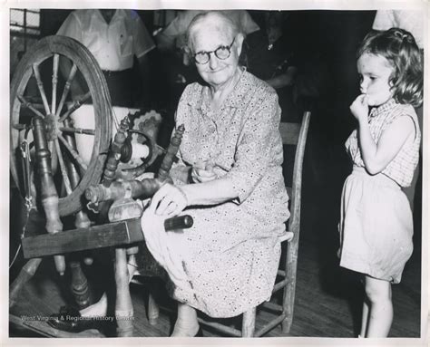 Girl Watching A Spinning Wheel At Glenville Folk Festival Glenville W