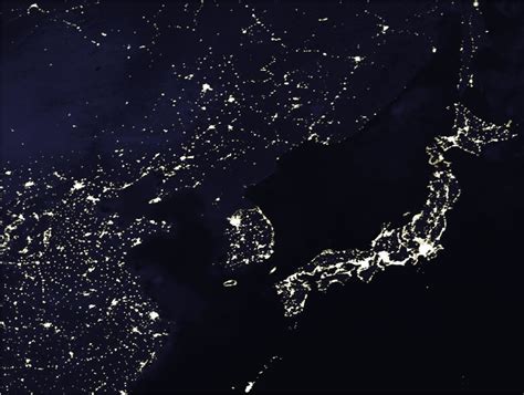 Korea at night, satellite image photographic print by planetobserver. North Korea is Dark