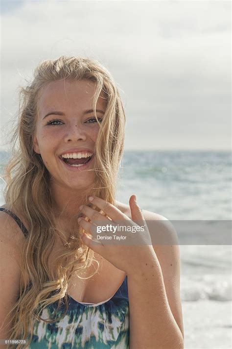 Young Blonde Teen Aged Girl Smiling At The Beach Photo Getty Images