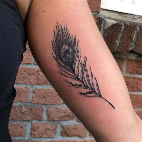 What does a single feather tattoo mean? Top 109 Best Peacock Feather Tattoo Ideas - [2020 ...