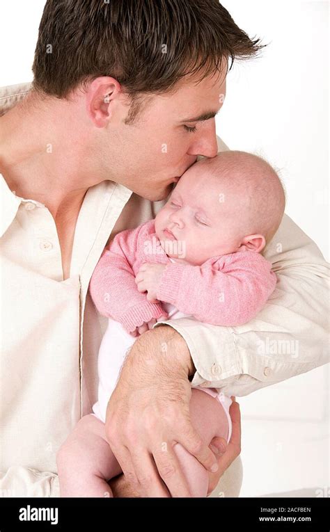 Father Kissing His Baby Stock Photo Alamy