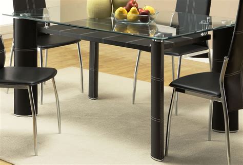 The beauty of eclectic decor is that you get to combine your favorite elements from different styles without them looking out of place. Wilner Rectangular Glass Top Dining Table from Homelegance ...