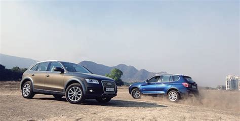 All three give you the flexibility to change gear manually by pulling paddles behind the steering wheel; Comparo - 2013 Audi Q5 vs BMW X3 - Overdrive