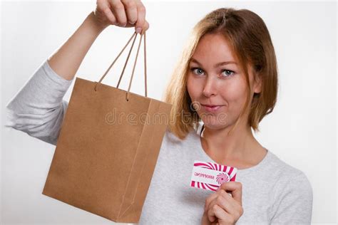 Shopping Close Up Portrait Of A Blonde Woman Holding A Bank Card And A