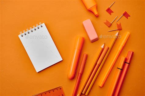 Stationery Suppliesmacro View Orange Background Stock Photo By Nomadsoul1