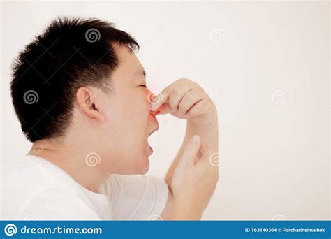 Sick Man Has Flurhinitis Cold Sicknesshe Is Sneezeconcept Healthcare And Medical Stock