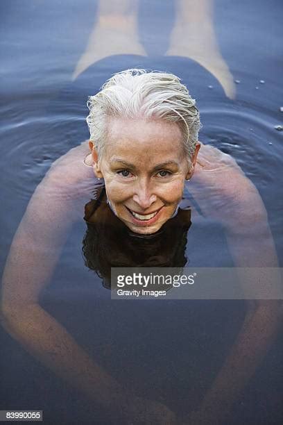 Mature Woman Swimming Lake Photos And Premium High Res Pictures Getty