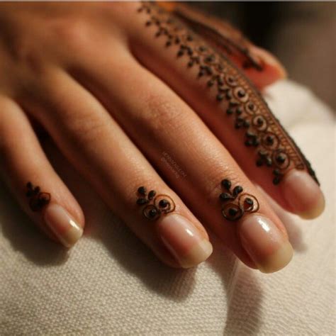This style is less time consuming and exertion expending as the add any design in the finger mehndi because it will look precisely beautiful like the rest of the you can also add some ethnic rings on your fingers to compliment the design and show off your artistry. Henna hand | Henna, Henna hand tattoo, Mehndi designs