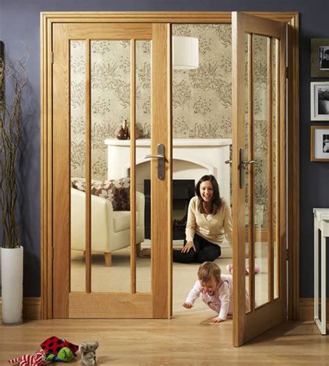 White glazed internal doors offer a modern touch to the traditional oak doors with glass. internal-glass-door-category | Shawfield Doors