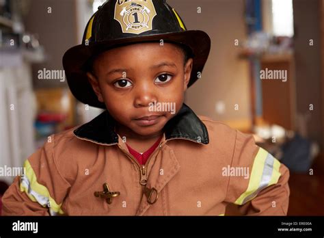 Black Boy Wearing Firefighter Halloween Costume Stock Photo Alamy