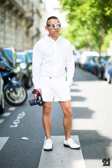 White Shorts And A Long Sleeved Shirt With White Shoes White Sneakers
