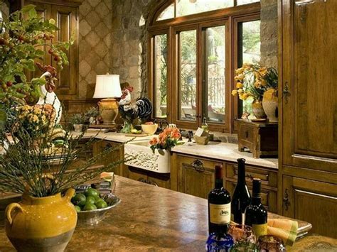 Colorful painted tiles complement the stone, giving the backsplash a lighter touch. 20 Gorgeous Kitchen Designs with Tuscan Decor
