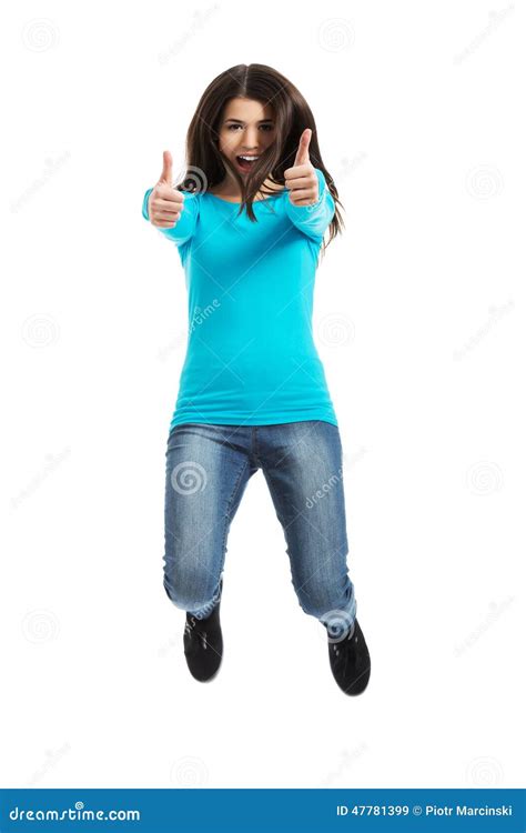 Young Happy Woman Jumping With Thumbs Up Stock Image Image Of