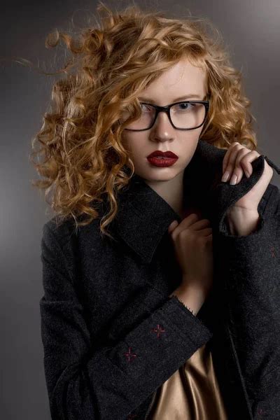 Beautiful Girl In Stylish Clothes With Glasses For Vision And Red Sexy